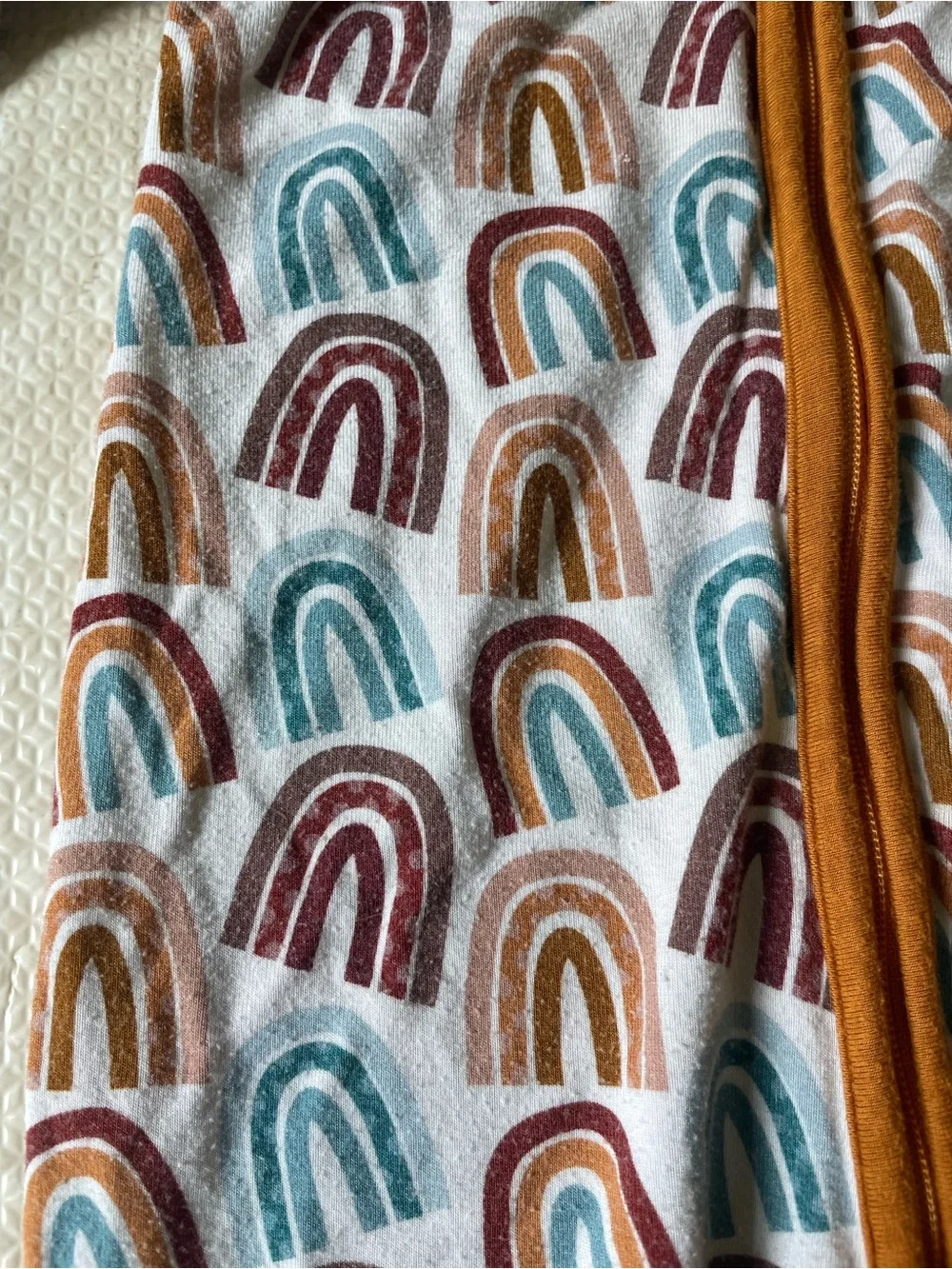 Millie and Roo Toddler Rainbow-Print Footed Pajama Set with Rust Trim